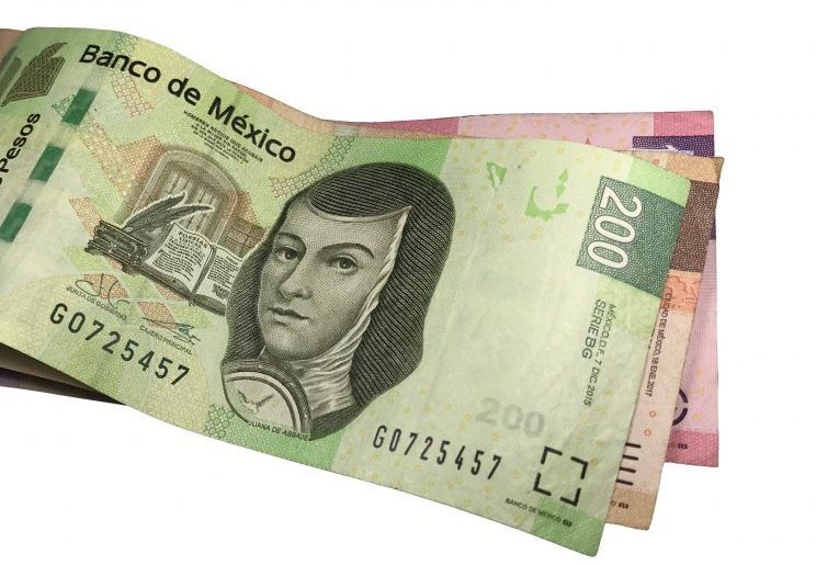 A,Bunch,Of,Mexican,Peso,Bills,Isolated,On,White,Background